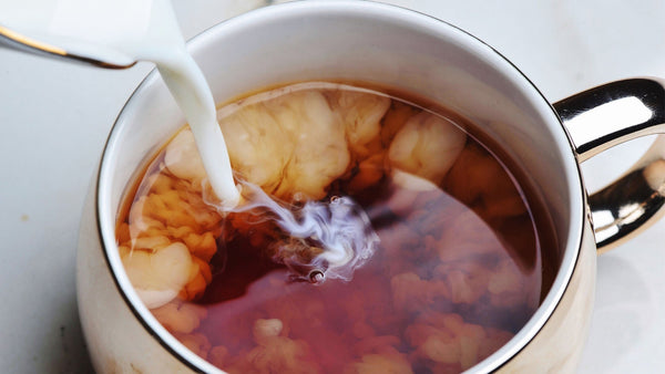 The Great Debate – should milk go in the cup before or after pouring the tea?